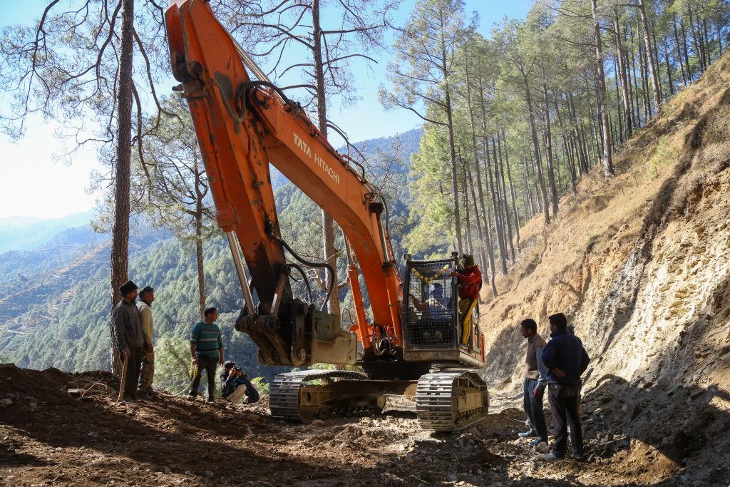 Machine being used to cut through rocks on hill above tunnel | Suraj Singh Bisht | ThePrint
